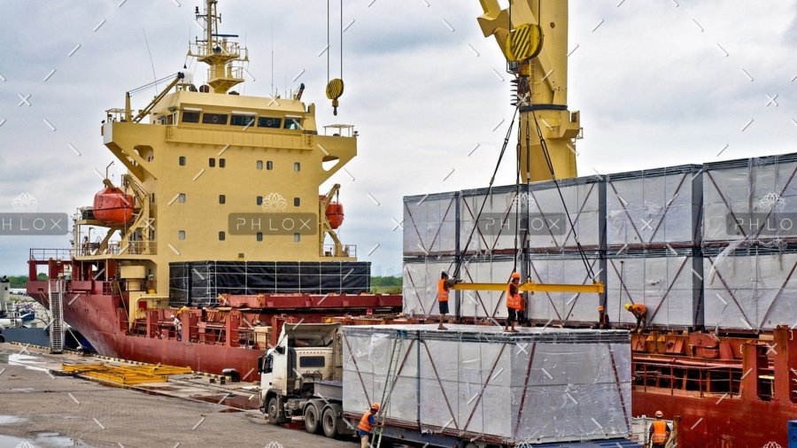 demo-attachment-23-loading-cargo-into-the-ship-in-harbor-PF86726